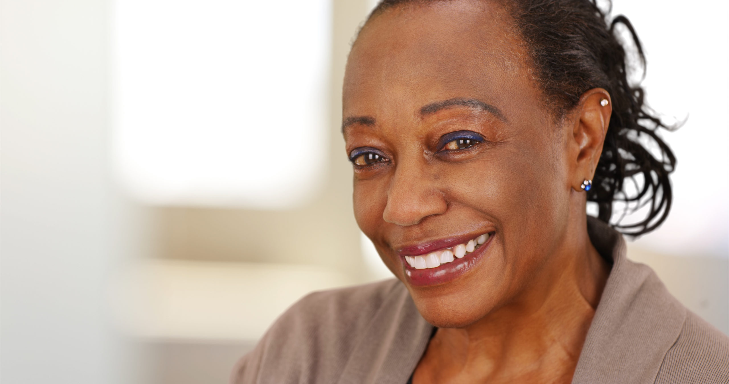 A Mid-career woman enjoying new job