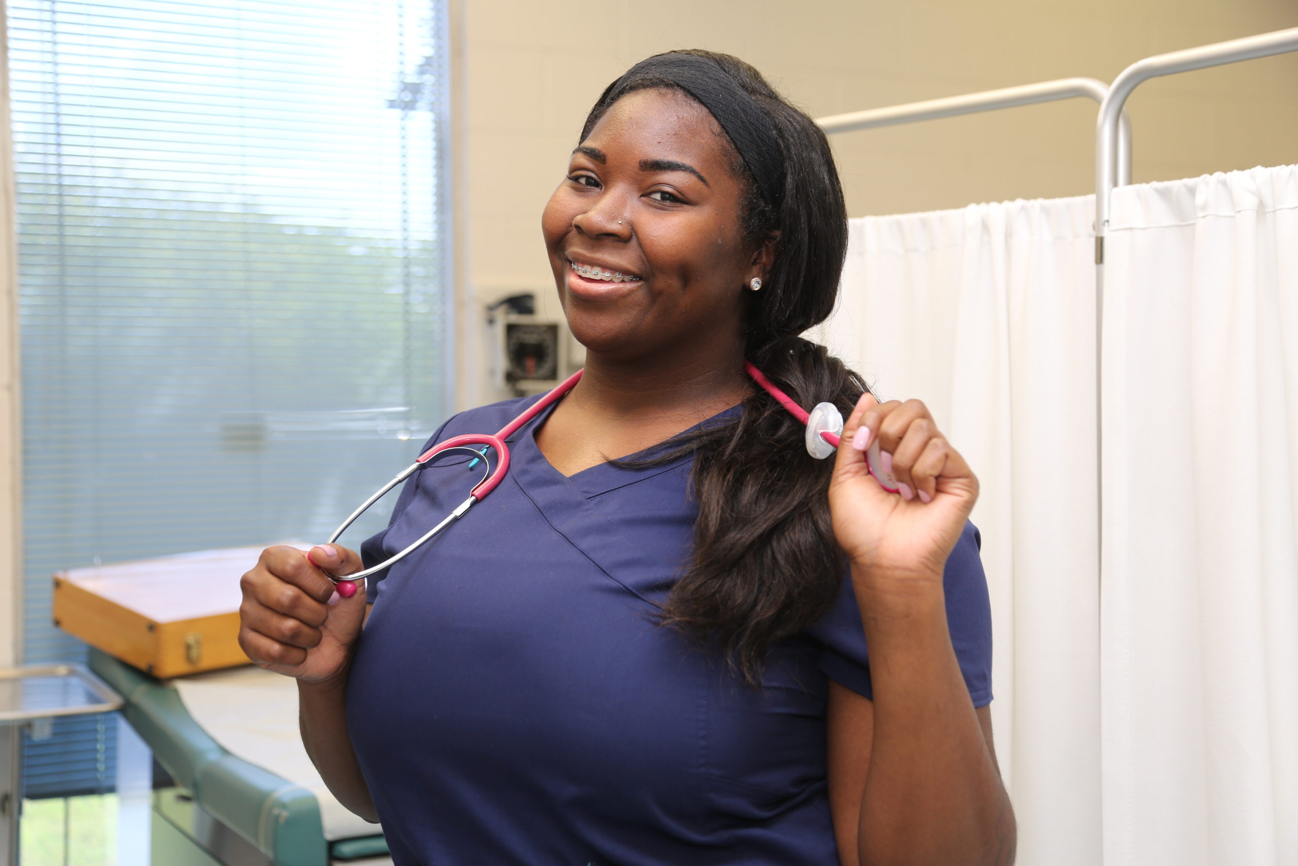 Portrait of a happy African American female healthcare professio